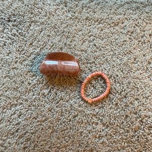 Claw lip and clay bead bracelet